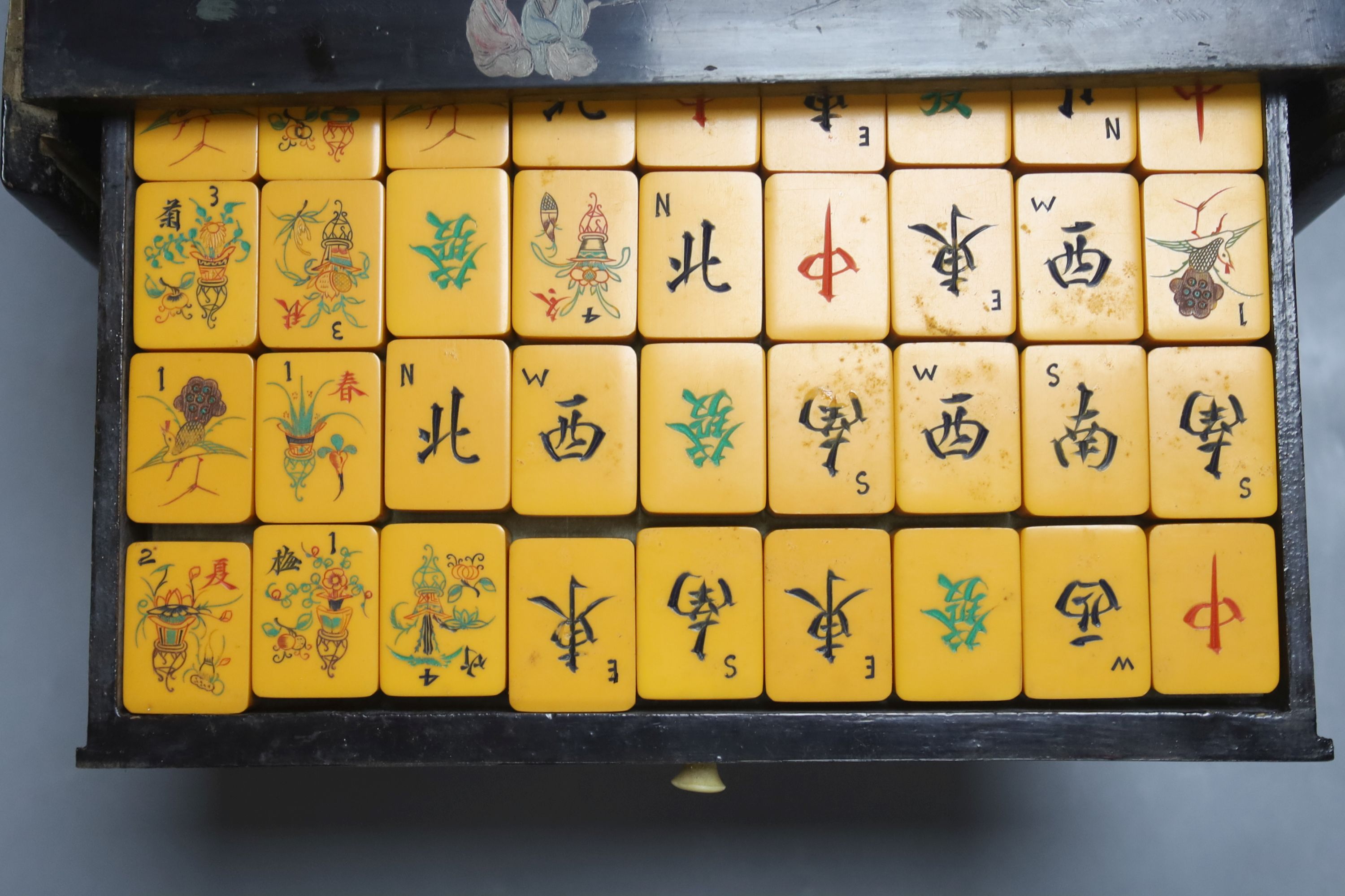 A Chinese lacquer cased Mah Jong set